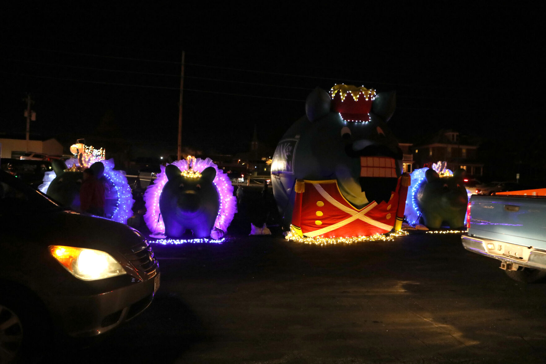 Cars drive past the Bank of Washington display